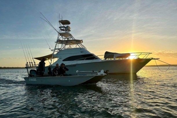 a small boat in a body of water