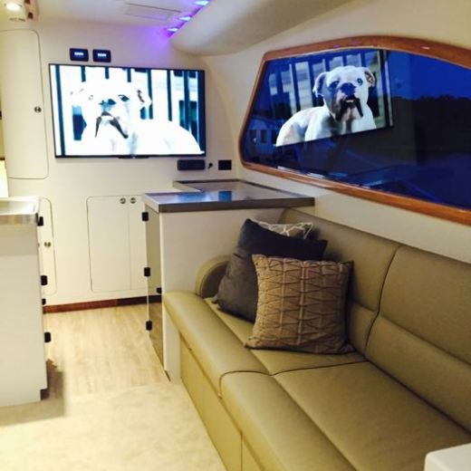 a room filled with furniture and a flat screen tv