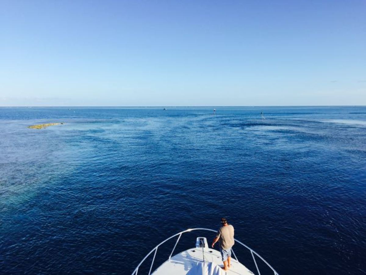 a small boat in a body of water
